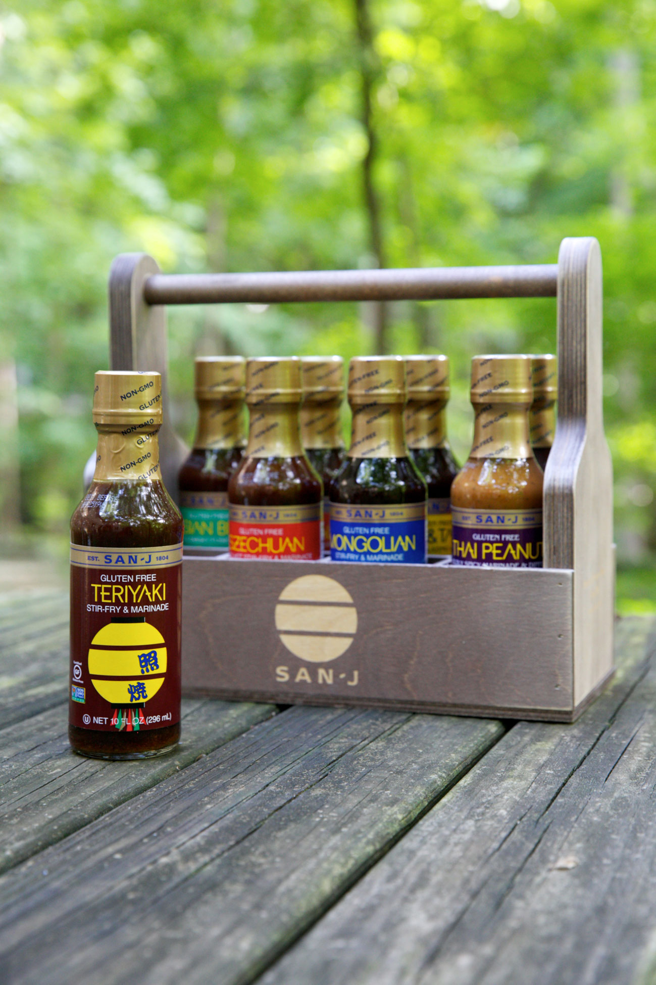 8 San-J Asian Cooking Sauces in a wooden caddy